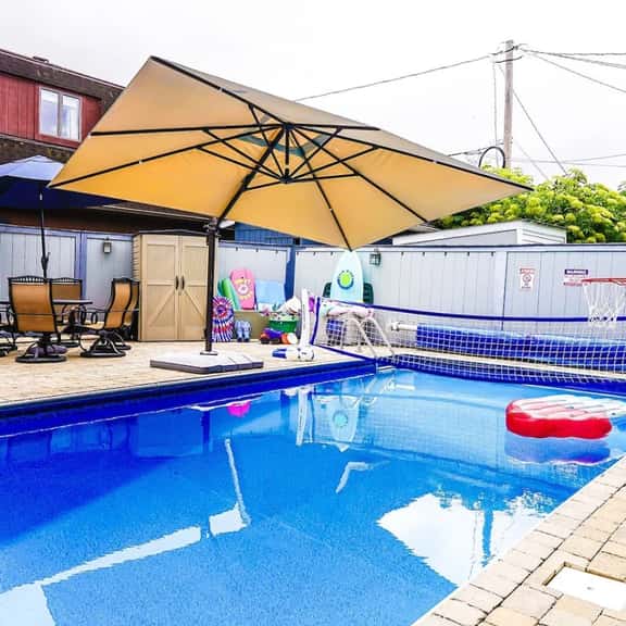 Private heated pool in back & Sandy beach in front - Image 1